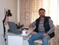 Edisher Giorgadze (4L4FN) operating his amateur radio station in Pyongyang.