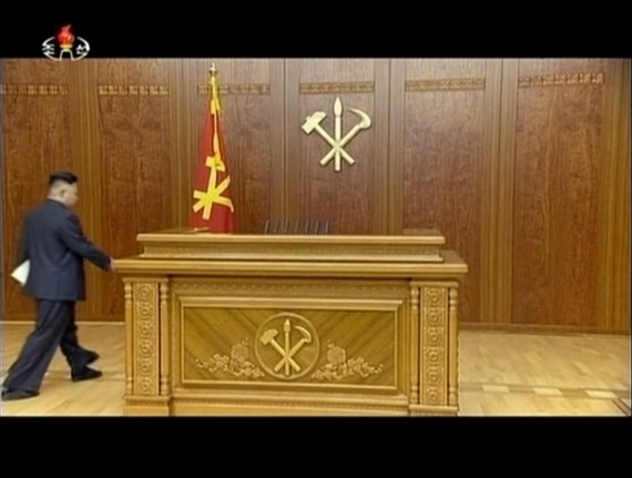 Kim Jong Un walks towards a dais to deliver his 2014 new year speech. KCTV screengrab.