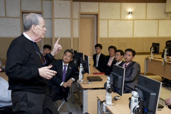 Prof Aaron Ciechanover makes a point to PUST research students during a visit on May 5, 2016. (Photo: Ian Wells / PUST)